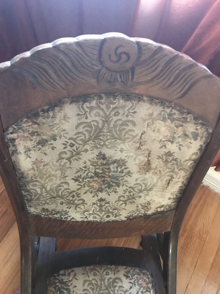 Victorian era folding rocking chair carving