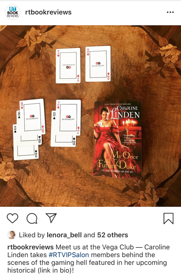 A screenshot featuring a photo of Caroline Linden's My Once Future Duke sitting atop an antique wooden table alongside playing cards.